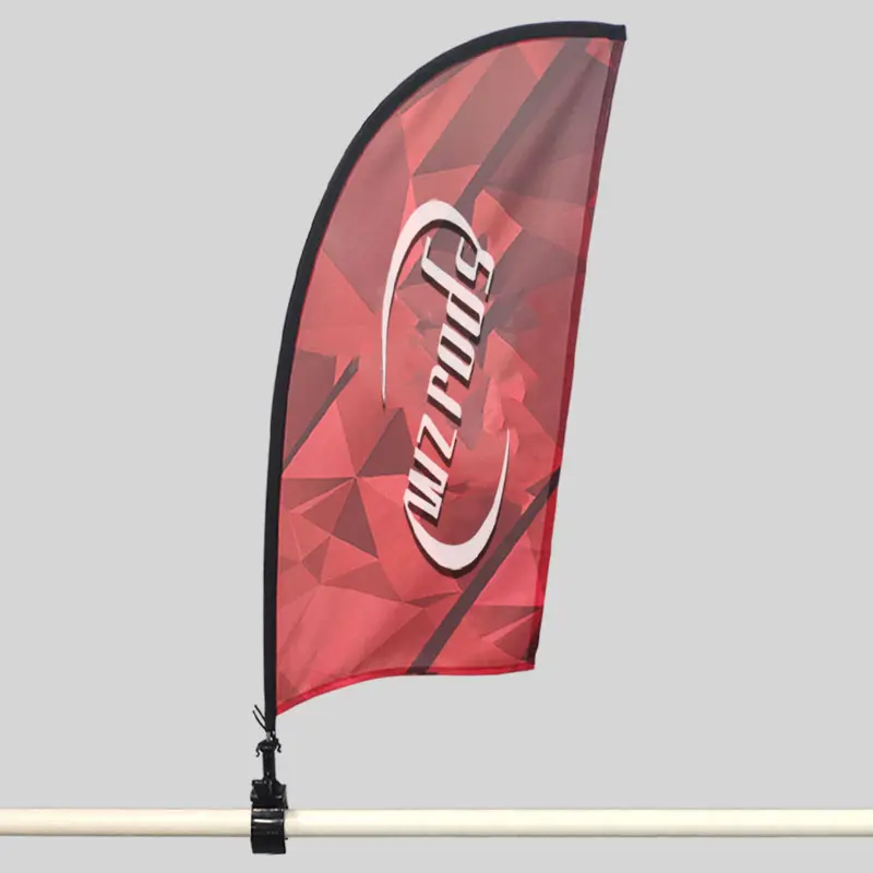 Red geometric-patterned Sports flag with black trim, mounted on a white pole using a Clip Banner clamp for dynamic outdoor advertising.