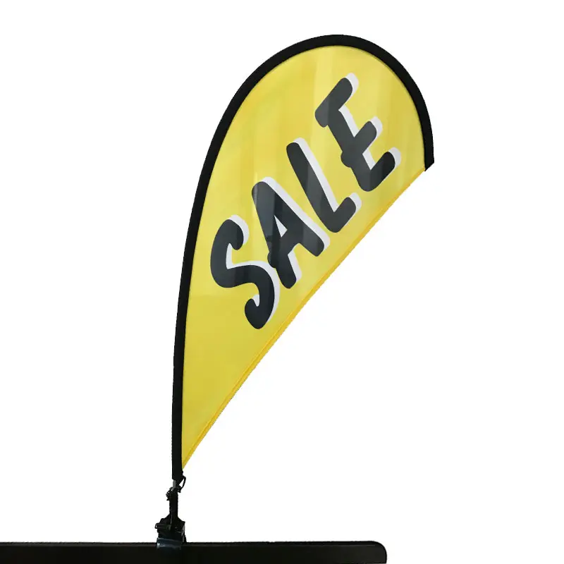 Yellow teardrop-shaped promotional flag with bold 'SALE' text, secured by a black Clip Banner clamp for retail discounts.