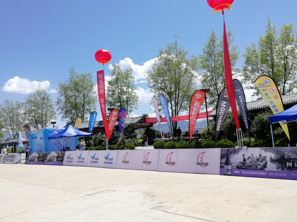2019 china mountain bike open image-4 WZRODS teardrop flags and branded arch at 2019 outdoor event with traditional architecture