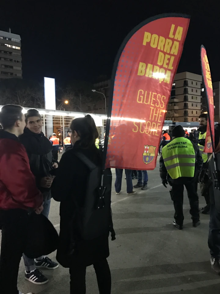 Red WZRODS flag at FC Barcelona event: 'LA PORRA DEL BARÇA' score-guessing promo, security staff in hi-vis vest